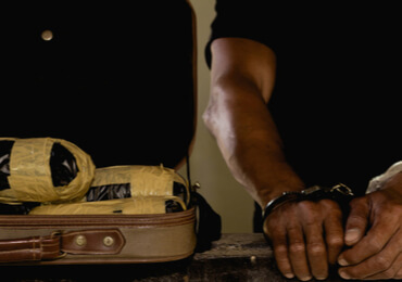 man handcuffed after being arrested of drug trafficking in Nevada
